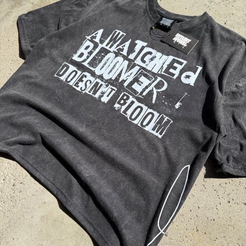 A Watched Bloomer Doesn’t Bloom NSA Black Tee Size L
