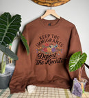 Deport The Racists Gildan Tops